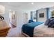 Cozy main bedroom with a plush bed, calm colors, and ample natural light creating a relaxing space at 1511 River Cane St, Edgemoor, SC 29712