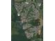 An aerial view shows a lakeside community with mature trees, numerous homes and several restaurants and community areas at 152 Eagle Dr # 27B, New London, NC 28127