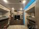 This bedroom features bunk beds, a television, and lots of storage space at 152 Eagle Dr # 27B, New London, NC 28127