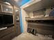 This bedroom features bunk beds, a television, and lots of storage space at 152 Eagle Dr # 27B, New London, NC 28127