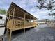 View of the covered porch on the park model at 152 Eagle Dr # 27B, New London, NC 28127