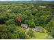 Aerial view of a property with mature trees providing ample shade and privacy at 1520 28Th Sw St, Hickory, NC 28602