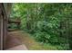 View of the backyard featuring a deck and wooded area at 1520 28Th Sw St, Hickory, NC 28602