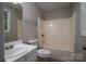 Bathroom showcasing a vanity sink, toilet, and tub/shower combo at 1520 28Th Sw St, Hickory, NC 28602