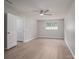 Spacious bedroom featuring a ceiling fan, neutral walls and wood flooring at 1520 28Th Sw St, Hickory, NC 28602