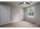 Clean bedroom with carpet floors, neutral paint, white trim and a bright window at 1520 28Th Sw St, Hickory, NC 28602