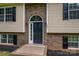 Close up of the front door and brick facade with clean landscaping at 1520 28Th Sw St, Hickory, NC 28602