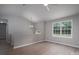 Bright living room featuring a large window and new floors at 1520 28Th Sw St, Hickory, NC 28602