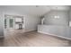 Open concept living room with durable floors flowing into the kitchen and dining area at 1520 28Th Sw St, Hickory, NC 28602