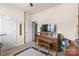 Charming bedroom featuring a piano, neutral walls, and soft carpet at 163 Carmen Way, Lancaster, SC 29720