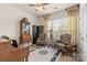 Cozy bedroom with natural light, patterned chairs, and antique furnishings at 163 Carmen Way, Lancaster, SC 29720