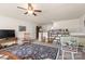 Bonus room featuring a ceiling fan, display shelving, and comfortable chairs at 163 Carmen Way, Lancaster, SC 29720