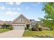 Charming single-Gathering home featuring a two-car garage and well-maintained landscaping at 163 Carmen Way, Lancaster, SC 29720