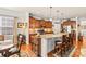 Bright kitchen with an island, granite countertops, and stainless steel appliances at 163 Carmen Way, Lancaster, SC 29720