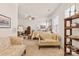 Bright main bedroom with plush carpet and natural light, featuring a sitting area and neutral tones at 163 Carmen Way, Lancaster, SC 29720