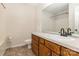 Bright bathroom featuring a single sink vanity and a shower-tub combination at 1638 Hunters Trl, Rock Hill, SC 29732