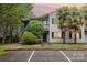 Home featuring a two-story structure, private balconies, and mature landscaping at 1638 Hunters Trl, Rock Hill, SC 29732