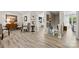 Hallway with light wood floors and multiple decor at 1644 Backcreek Ln, Gastonia, NC 28054