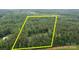 Aerial view highlighting the property's expansive wooded acreage, marked by estimated boundary lines at 213 Genesis Pl, Cleveland, NC 27013