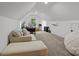 Spacious carpeted bonus room with neutral colors and a cozy seating area at 213 Genesis Pl, Cleveland, NC 27013