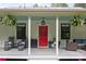 Inviting front porch with rocking chairs, comfortable seating, and charming details creates a welcoming atmosphere at 213 Genesis Pl, Cleveland, NC 27013