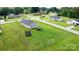 Aerial view of home showcasing the spacious lawn, gazebo, trampoline, and neighborhood at 2411 28Th Ne St, Hickory, NC 28601