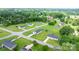 Wide aerial view of the neighborhood displaying the property's placement and surrounding greenery and homes at 2411 28Th Ne St, Hickory, NC 28601