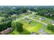 Expansive aerial view of the neighborhood, showcasing the home's proximity to lush greenery and other residences at 2411 28Th Ne St, Hickory, NC 28601
