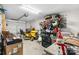 Organized garage featuring a lawn mower, shelving, and ample storage space for tools and equipment at 2411 28Th Ne St, Hickory, NC 28601