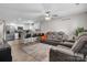 Inviting living room with an open floorplan, modern furniture, and seamless flow into the well-equipped kitchen at 2411 28Th Ne St, Hickory, NC 28601