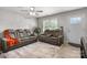 Comfortable living room area with plush seating, a stylish rug, and a bright, welcoming atmosphere at 2411 28Th Ne St, Hickory, NC 28601