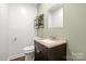 Bathroom with a toilet, sink and vanity at 2522 Doster Rd, Monroe, NC 28112