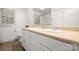 Bright bathroom featuring a double sink vanity and a framed mirror at 2522 Doster Rd, Monroe, NC 28112