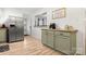 Bright kitchen featuring stainless steel refrigerator, butcher block countertops, and stylish cabinets at 2522 Doster Rd, Monroe, NC 28112
