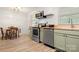 Kitchen with stainless steel appliances, butcher block countertop, and attached dining table at 2522 Doster Rd, Monroe, NC 28112