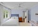 Bright bedroom with carpet, window, and walk-in closet at 2814 Glendale Rd, Charlotte, NC 28209