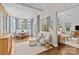 Elegant dining room featuring a bay window, stylish seating, and natural light at 2814 Glendale Rd, Charlotte, NC 28209