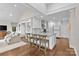 Open concept kitchen with granite countertops, stainless appliances, and bar stool seating at 2814 Glendale Rd, Charlotte, NC 28209