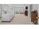 Spacious main bedroom featuring a large bed, bay window, and classic furnishings at 2814 Glendale Rd, Charlotte, NC 28209