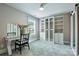 Bright bedroom featuring a vanity and closet with shelving at 2844 Georgia Ave, Charlotte, NC 28205