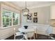 Dining area with modern lighting and a view to the backyard at 2844 Georgia Ave, Charlotte, NC 28205