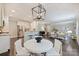Open concept living space with kitchen, dining, and living room at 2844 Georgia Ave, Charlotte, NC 28205