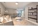 Bright loft with neutral decor, seating, and hallway leading to additional rooms at 2844 Georgia Ave, Charlotte, NC 28205