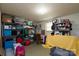 Unfinished basement featuring tons of storage on metal shelving units at 318 Confederate Sw Dr, Concord, NC 28027