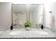 Modern bathroom vanity with dual sinks, granite countertops, and brushed nickel faucets at 3403 Keith Dr, Charlotte, NC 28269