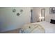 Cozy bedroom featuring a comfortable bed with throw blanket and stylish wall decor at 3403 Keith Dr, Charlotte, NC 28269