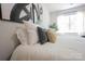 Bright bedroom featuring neutral decor, natural light, and comfortable bedding at 3403 Keith Dr, Charlotte, NC 28269