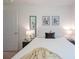 Serene bedroom featuring neutral tones, contemporary artwork, and comfortable furnishings at 3403 Keith Dr, Charlotte, NC 28269