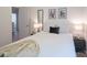 Bright bedroom featuring a comfortable bed, modern decor, and neutral color palette at 3403 Keith Dr, Charlotte, NC 28269