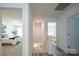Upper level hallway leading to bedrooms showcasing neutral tones and inviting spaces with natural light at 3403 Keith Dr, Charlotte, NC 28269